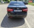 Чорний Кіа Ріо, об'ємом двигуна 1.4 л та пробігом 186 тис. км за 6800 $, фото 1 на Automoto.ua