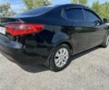 Черный Киа Рио, объемом двигателя 1.6 л и пробегом 142 тыс. км за 6412 $, фото 2 на Automoto.ua