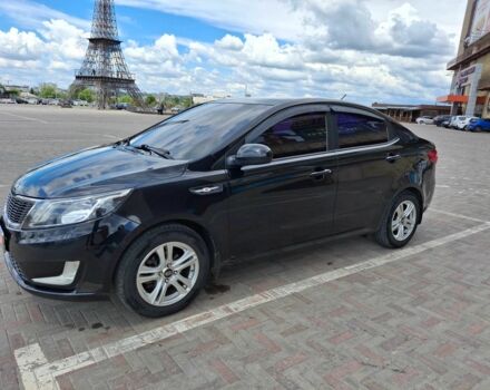 Чорний Кіа Ріо, об'ємом двигуна 1.4 л та пробігом 96 тис. км за 7999 $, фото 3 на Automoto.ua