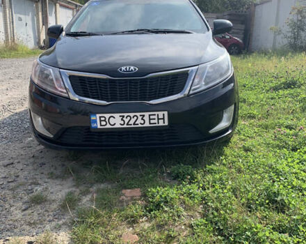 Черный Киа Рио, объемом двигателя 1.4 л и пробегом 212 тыс. км за 7800 $, фото 2 на Automoto.ua