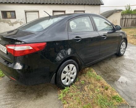 Чорний Кіа Ріо, об'ємом двигуна 1.4 л та пробігом 88 тис. км за 8300 $, фото 6 на Automoto.ua