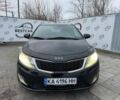 Чорний Кіа Ріо, об'ємом двигуна 1.4 л та пробігом 214 тис. км за 7700 $, фото 4 на Automoto.ua