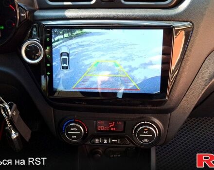 Киа Рио 2013 в Ромнах на Automoto.ua Черный Киа Рио, объемом двигателя 1.6 л и пробегом 130 тыс. км за 8750 $, фото 6 на Automoto.ua