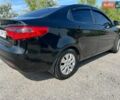 Чорний Кіа Ріо, об'ємом двигуна 1.6 л та пробігом 142 тис. км за 6800 $, фото 3 на Automoto.ua