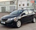 Черный Киа Рио, объемом двигателя 1.4 л и пробегом 305 тыс. км за 4950 $, фото 1 на Automoto.ua