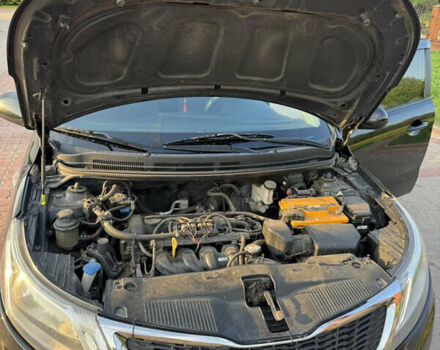 Черный Киа Рио, объемом двигателя 1.4 л и пробегом 183 тыс. км за 7000 $, фото 20 на Automoto.ua