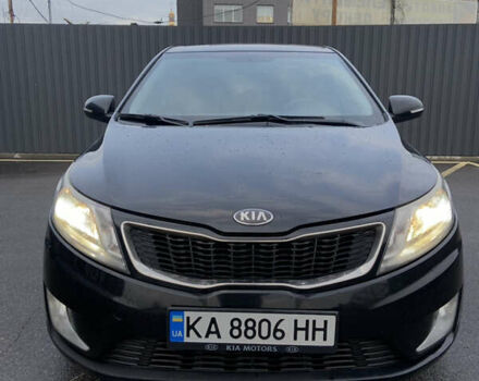 Чорний Кіа Ріо, об'ємом двигуна 1.6 л та пробігом 261 тис. км за 7650 $, фото 1 на Automoto.ua