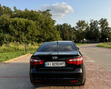 Черный Киа Рио, объемом двигателя 1.4 л и пробегом 183 тыс. км за 7000 $, фото 4 на Automoto.ua