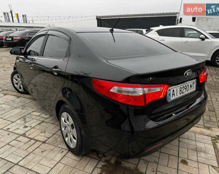 Черный Киа Рио, объемом двигателя 1.4 л и пробегом 185 тыс. км за 6999 $, фото 2 на Automoto.ua