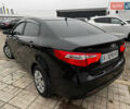 Черный Киа Рио, объемом двигателя 1.4 л и пробегом 185 тыс. км за 6999 $, фото 2 на Automoto.ua