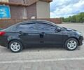 Черный Киа Рио, объемом двигателя 1.4 л и пробегом 96 тыс. км за 9200 $, фото 3 на Automoto.ua