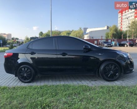 Чорний Кіа Ріо, об'ємом двигуна 1.4 л та пробігом 92 тис. км за 10000 $, фото 3 на Automoto.ua