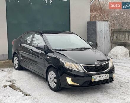 Черный Киа Рио, объемом двигателя 1.4 л и пробегом 124 тыс. км за 9350 $, фото 2 на Automoto.ua