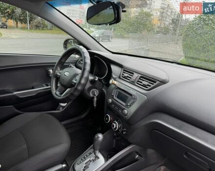 Чорний Кіа Ріо, об'ємом двигуна 1.4 л та пробігом 107 тис. км за 7500 $, фото 6 на Automoto.ua
