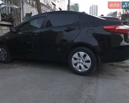 Черный Киа Рио, объемом двигателя 1.4 л и пробегом 102 тыс. км за 2600 $, фото 1 на Automoto.ua