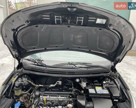 Черный Киа Рио, объемом двигателя 1.4 л и пробегом 124 тыс. км за 9350 $, фото 136 на Automoto.ua