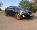 Черный Киа Рио, объемом двигателя 1.6 л и пробегом 155 тыс. км за 8500 $, фото 1 на Automoto.ua