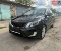 Черный Киа Рио, объемом двигателя 1.6 л и пробегом 61 тыс. км за 10300 $, фото 1 на Automoto.ua
