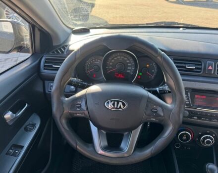 Чорний Кіа Ріо, об'ємом двигуна 1.4 л та пробігом 214 тис. км за 7700 $, фото 9 на Automoto.ua