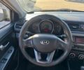Чорний Кіа Ріо, об'ємом двигуна 1.4 л та пробігом 214 тис. км за 7700 $, фото 9 на Automoto.ua