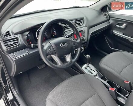 Черный Киа Рио, объемом двигателя 1.4 л и пробегом 124 тыс. км за 9350 $, фото 101 на Automoto.ua