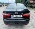 Черный Киа Рио, объемом двигателя 1.4 л и пробегом 89 тыс. км за 8300 $, фото 4 на Automoto.ua