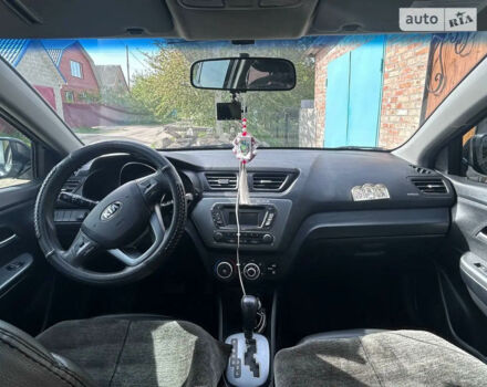 Чорний Кіа Ріо, об'ємом двигуна 1.4 л та пробігом 86 тис. км за 7400 $, фото 5 на Automoto.ua