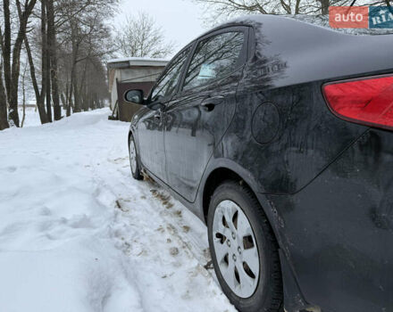Чорний Кіа Ріо, об'ємом двигуна 1.4 л та пробігом 123 тис. км за 7300 $, фото 4 на Automoto.ua