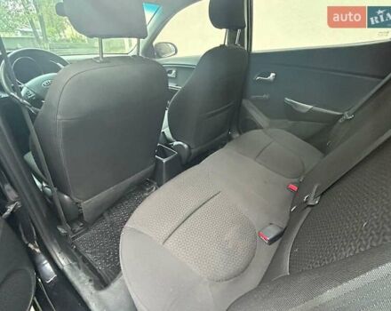Чорний Кіа Ріо, об'ємом двигуна 1.4 л та пробігом 141 тис. км за 7200 $, фото 8 на Automoto.ua