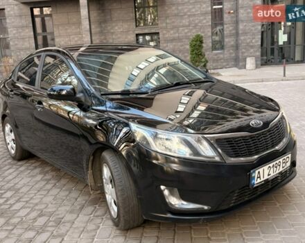 Чорний Кіа Ріо, об'ємом двигуна 1.6 л та пробігом 272 тис. км за 5950 $, фото 3 на Automoto.ua