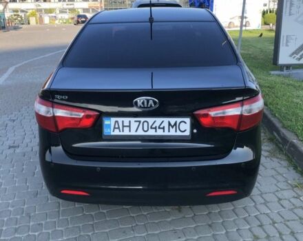 Чорний Кіа Ріо, об'ємом двигуна 1.4 л та пробігом 92 тис. км за 10000 $, фото 4 на Automoto.ua