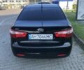 Чорний Кіа Ріо, об'ємом двигуна 1.4 л та пробігом 92 тис. км за 10000 $, фото 4 на Automoto.ua