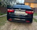 Черный Киа Рио, объемом двигателя 1.4 л и пробегом 160 тыс. км за 7600 $, фото 1 на Automoto.ua