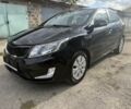Чорний Кіа Ріо, об'ємом двигуна 1.6 л та пробігом 61 тис. км за 10351 $, фото 5 на Automoto.ua