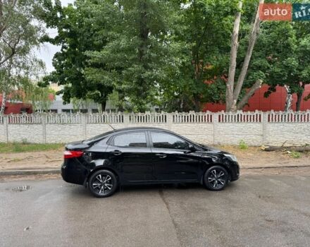 Чорний Кіа Ріо, об'ємом двигуна 1.4 л та пробігом 107 тис. км за 7500 $, фото 2 на Automoto.ua