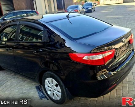 Киа Рио 2013 в Ромнах на Automoto.ua Черный Киа Рио, объемом двигателя 1.6 л и пробегом 130 тыс. км за 8750 $, фото 3 на Automoto.ua