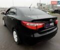 Черный Киа Рио, объемом двигателя 1.4 л и пробегом 220 тыс. км за 8200 $, фото 23 на Automoto.ua