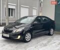 Черный Киа Рио, объемом двигателя 1.4 л и пробегом 124 тыс. км за 9350 $, фото 5 на Automoto.ua