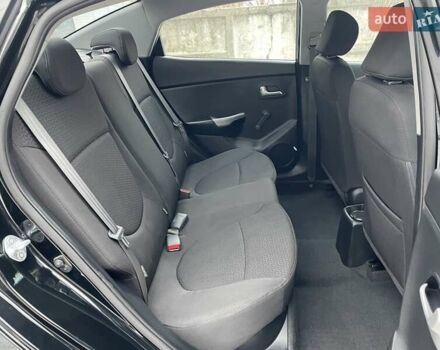 Черный Киа Рио, объемом двигателя 1.4 л и пробегом 124 тыс. км за 9350 $, фото 121 на Automoto.ua