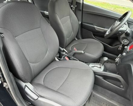 Чорний Кіа Ріо, об'ємом двигуна 1.4 л та пробігом 45 тис. км за 9800 $, фото 18 на Automoto.ua