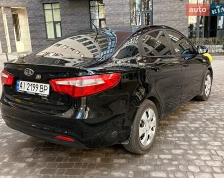 Чорний Кіа Ріо, об'ємом двигуна 1.6 л та пробігом 272 тис. км за 5950 $, фото 6 на Automoto.ua
