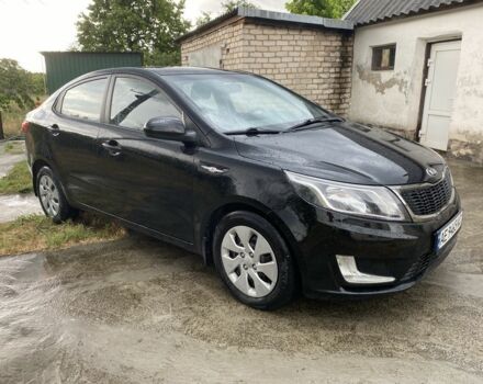 Чорний Кіа Ріо, об'ємом двигуна 1.4 л та пробігом 88 тис. км за 8300 $, фото 5 на Automoto.ua