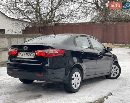 Черный Киа Рио, объемом двигателя 1.4 л и пробегом 124 тыс. км за 9350 $, фото 12 на Automoto.ua