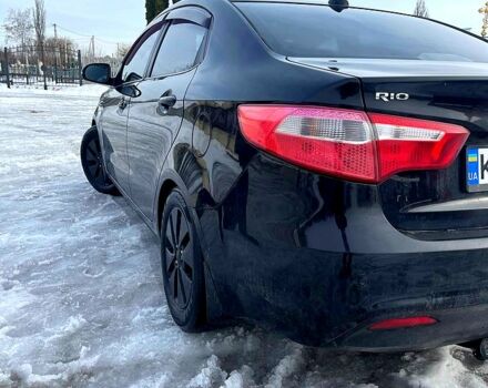 Чорний Кіа Ріо, об'ємом двигуна 1.6 л та пробігом 320 тис. км за 6500 $, фото 4 на Automoto.ua