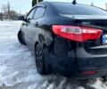 Чорний Кіа Ріо, об'ємом двигуна 1.6 л та пробігом 320 тис. км за 6500 $, фото 4 на Automoto.ua