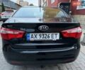 Чорний Кіа Ріо, об'ємом двигуна 1.4 л та пробігом 87 тис. км за 7700 $, фото 7 на Automoto.ua