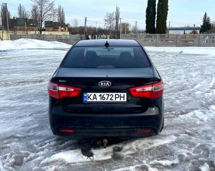 Чорний Кіа Ріо, об'ємом двигуна 1.6 л та пробігом 320 тис. км за 6500 $, фото 3 на Automoto.ua