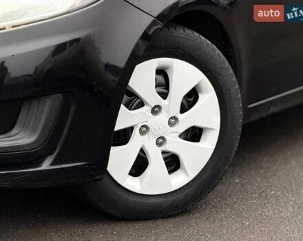 Черный Киа Рио, объемом двигателя 1.4 л и пробегом 220 тыс. км за 8200 $, фото 4 на Automoto.ua
