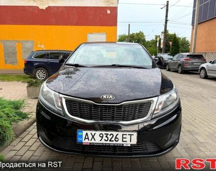 Чорний Кіа Ріо, об'ємом двигуна 1.4 л та пробігом 87 тис. км за 7700 $, фото 2 на Automoto.ua