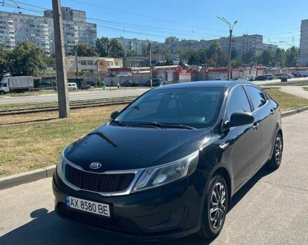 Черный Киа Рио, объемом двигателя 1.4 л и пробегом 200 тыс. км за 6500 $, фото 4 на Automoto.ua
